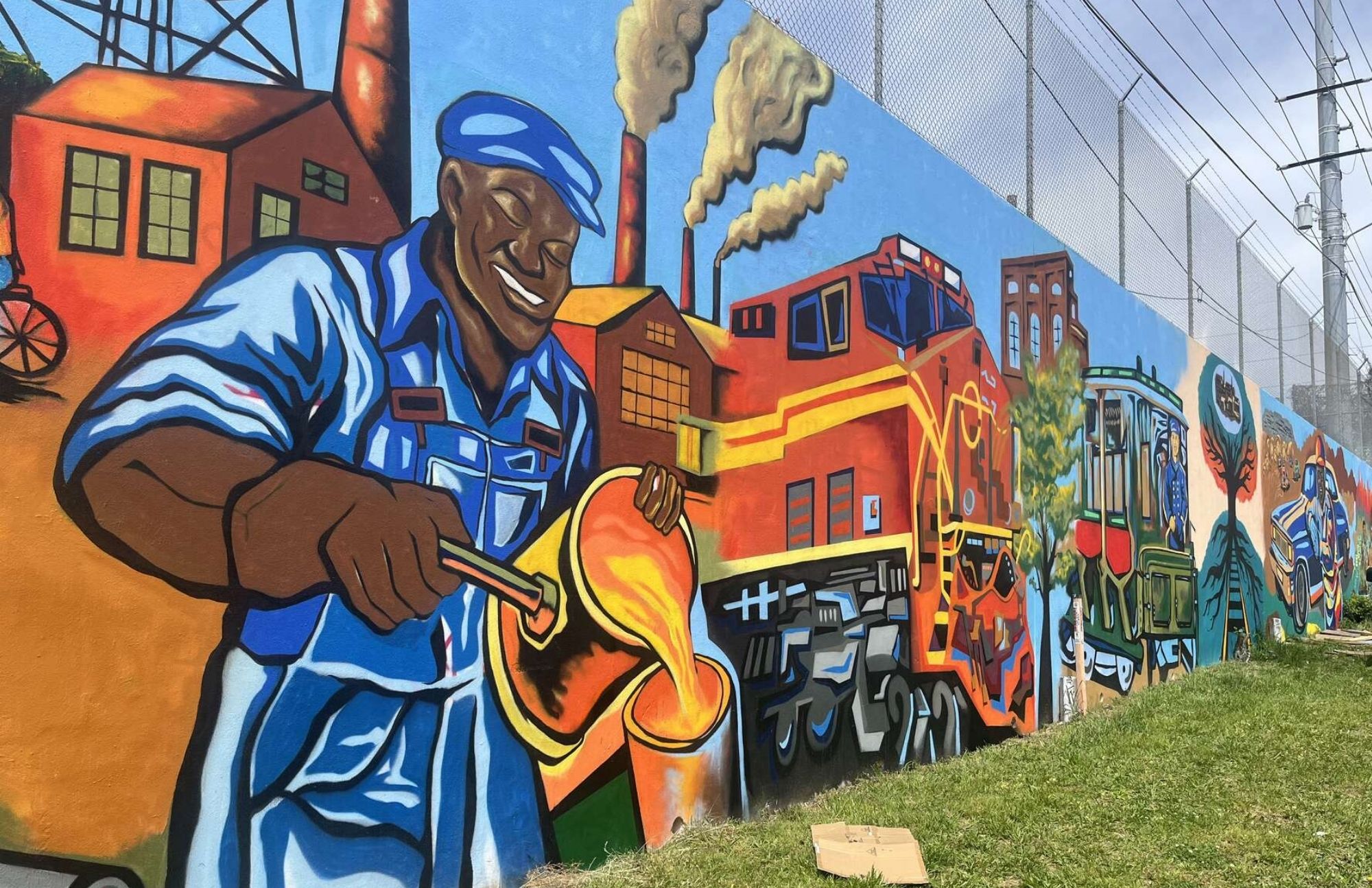 Foundry worker and railroad panel of the Blandtown mural depicting Atlanta's industrial heritage