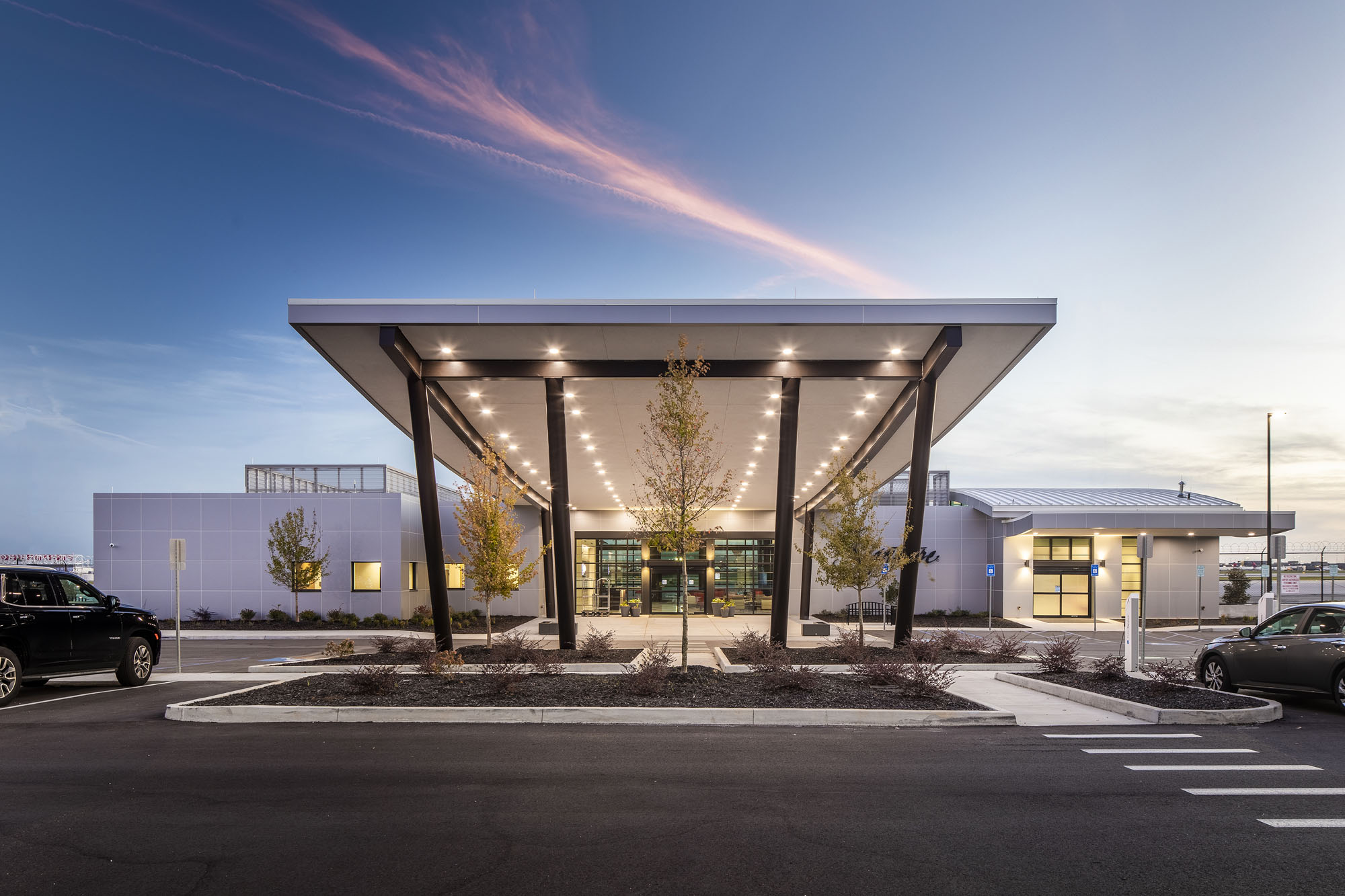 Exterior view of the Signature Aviation Executive Terminal building at Hartsfield-Jackson Atlanta International Airport at dusk