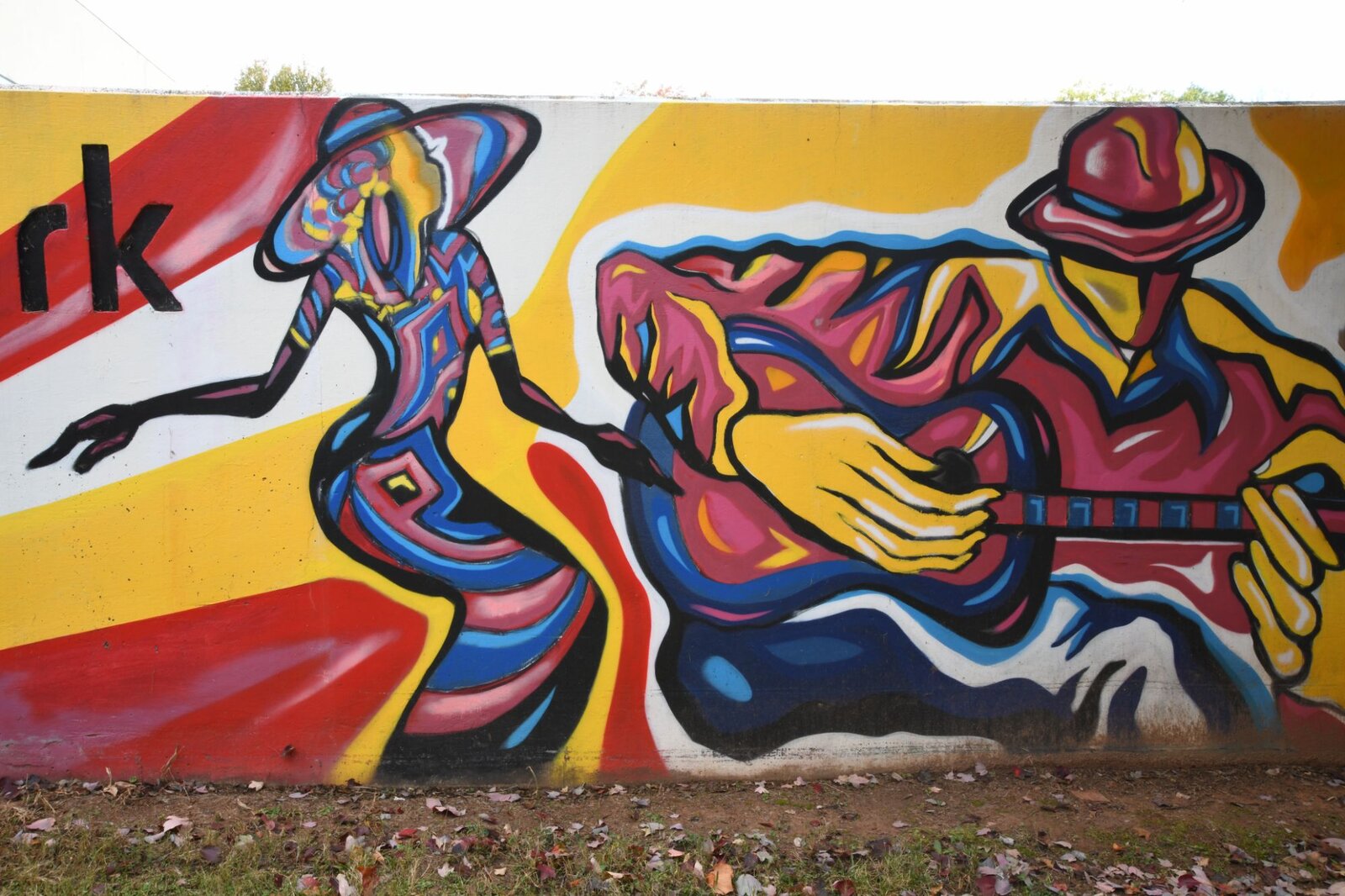 Detail of a guitarist and dancer, Pittman Park mural by Atlanta muralist Corey Barksdale