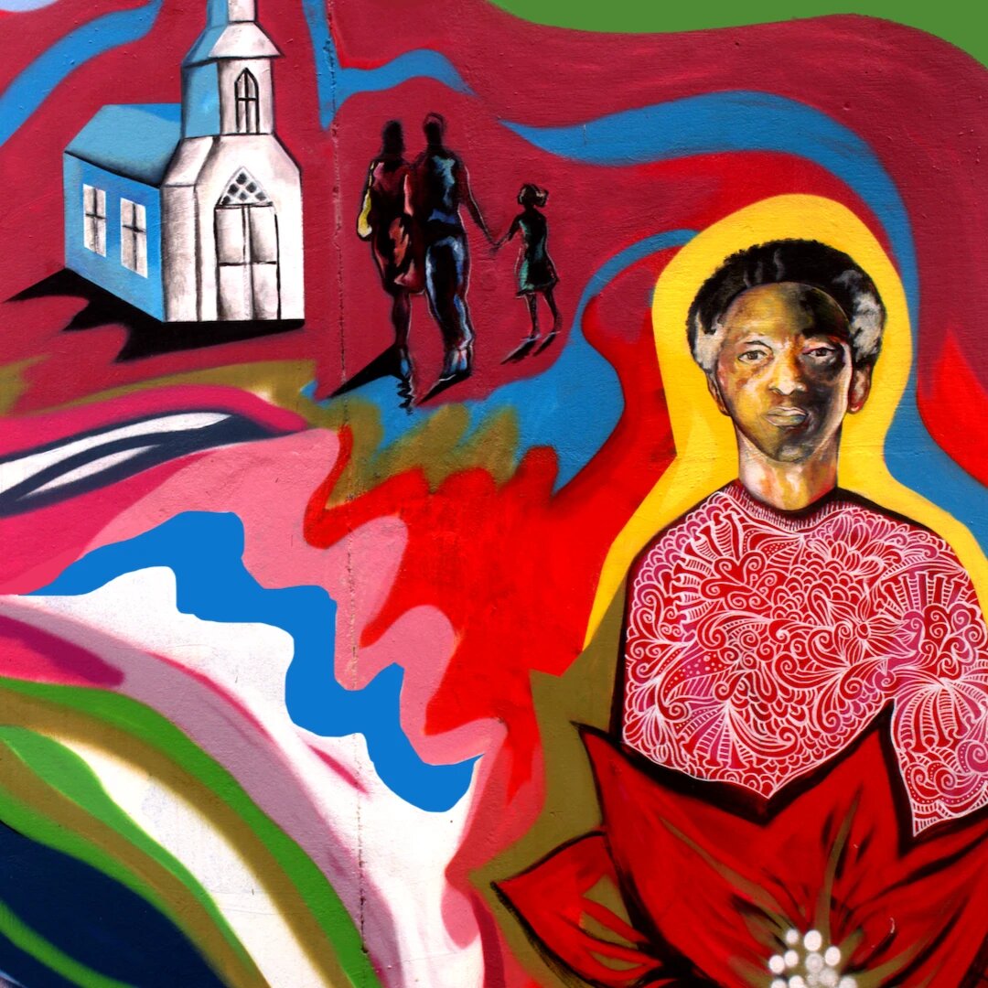 Detail of the haloed saint portrait in the Pittman Park mural by Atlanta muralist Corey Barksdale